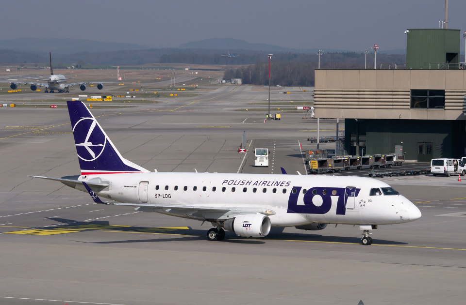 An Embraer 170LR of LOT Polish Airlines at an airport