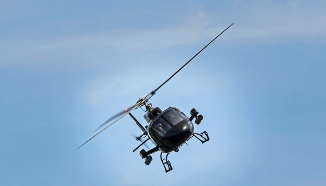 Image of a Helicopter flying at an angle