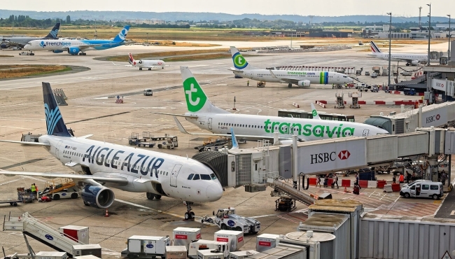 AIGLE AZUR and transavia aircraft parked in airport