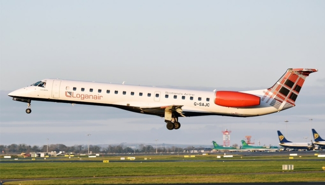 a loganair embraer jet taking off from an airport with sky and other airplanes in the background