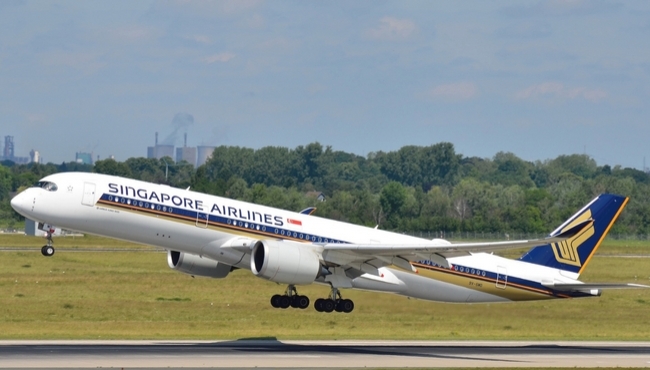Singapore Airlines Plane on the run way taking off