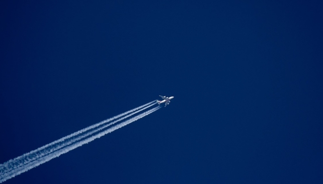 Aeroplane flying in a blue sky