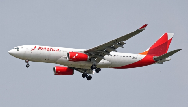 An Avianca Airbus A330-200 aircraft in flight with landing gear extended